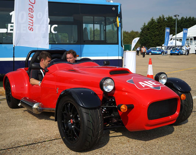 A red color British made sports car powered by a single rotor rotary engine with AIE logo